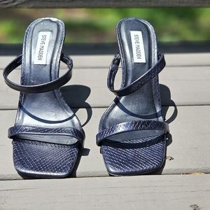 Women's size 8.5 Steve Madden Snake high heels